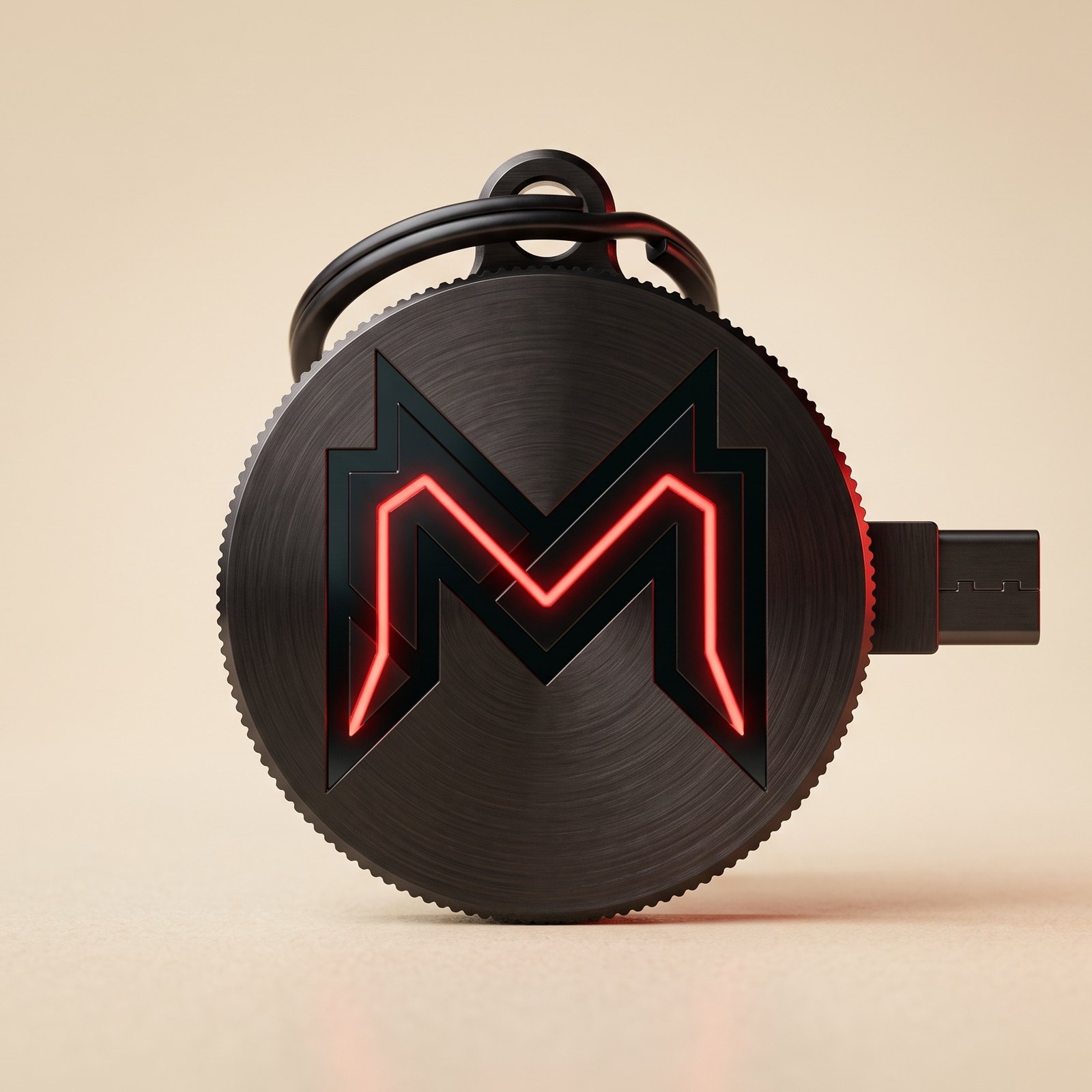 MIND Key, a brushed black steel coin medallion with the MIND M glowing red and a fold-out USB-C